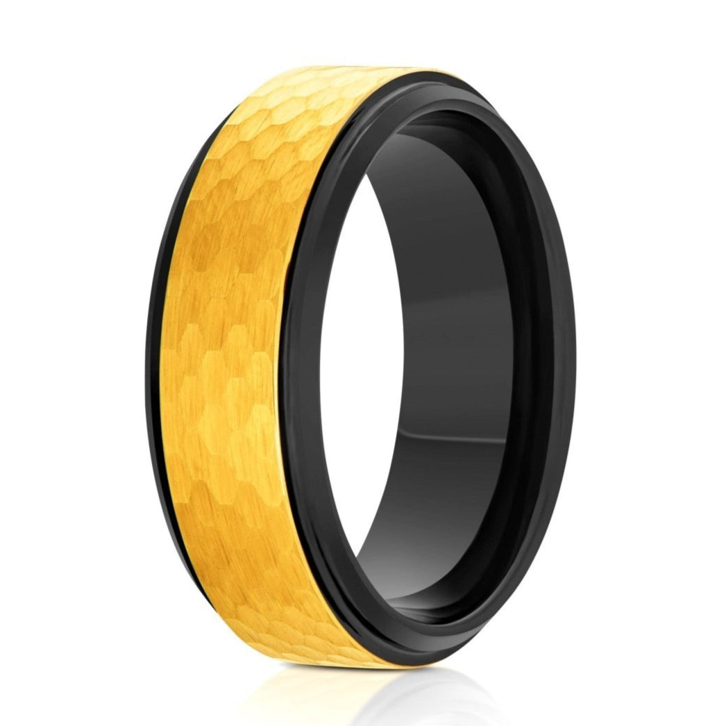 The Iconic, a black and gold tungsten carbide scratch-resistant ring that features a gold hammered and brushed center with polished stepped black edges and band.