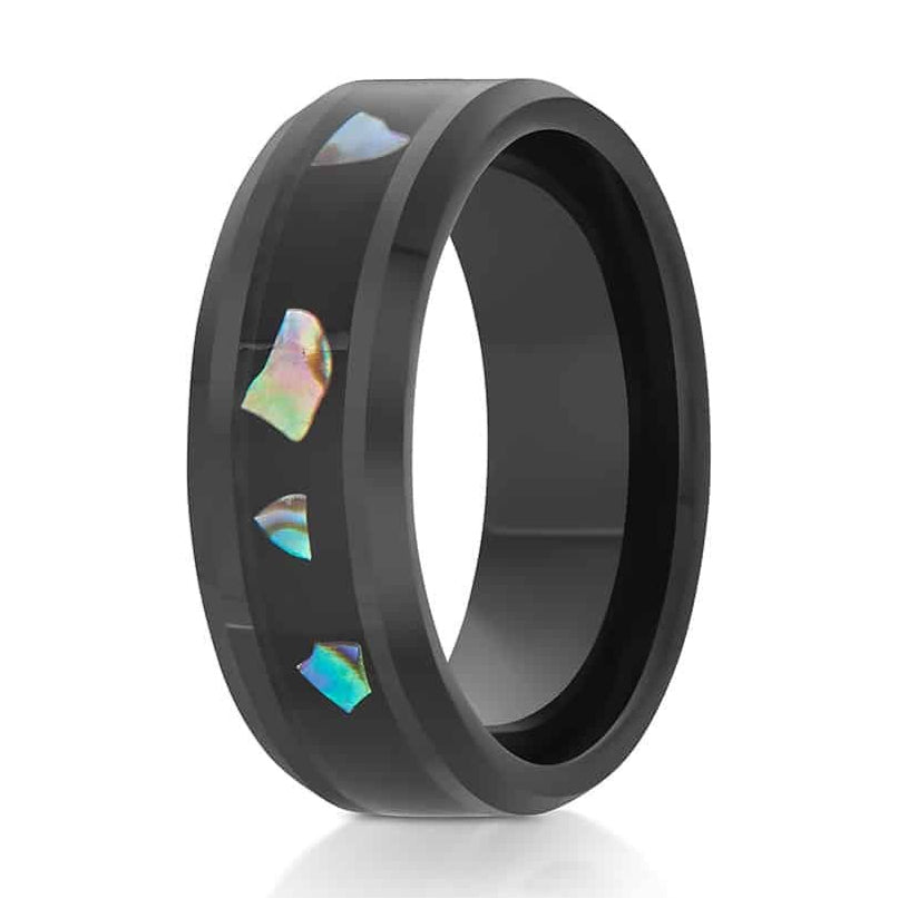 The Pepper, a black tungsten carbide ring that features a polished finish and a black resin and abalone inlay center.