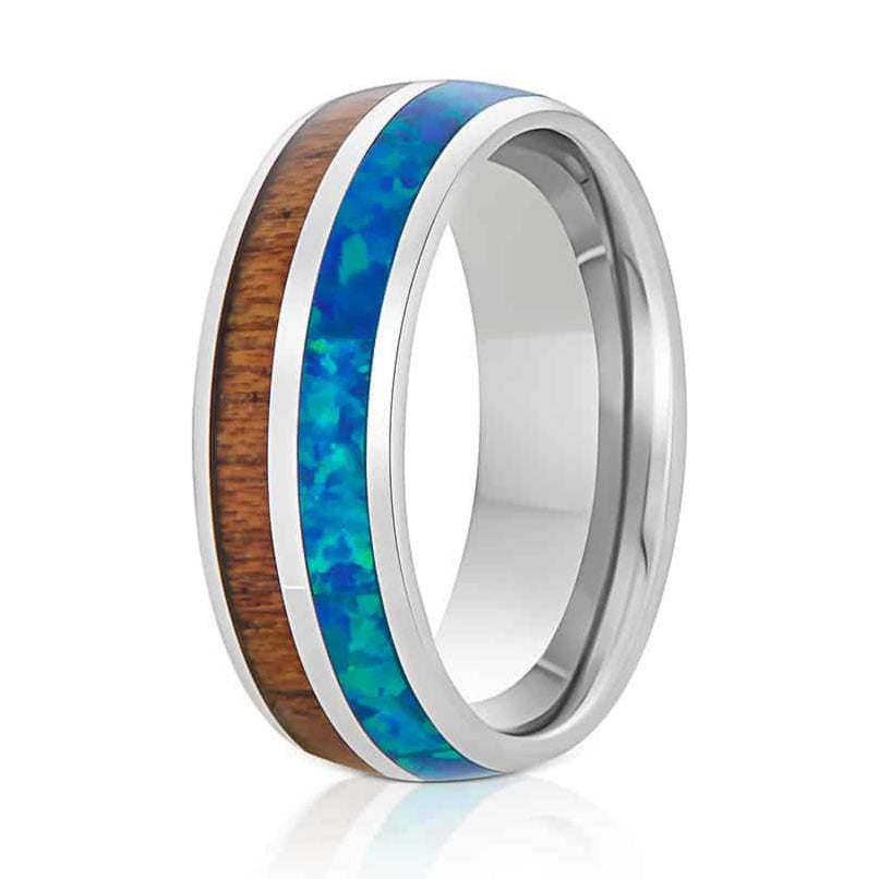 The Sheridan, a silver tungsten carbide ring that features a polished finish, Hawaiian Koa wood inlay, and vivid blue opal inlay.