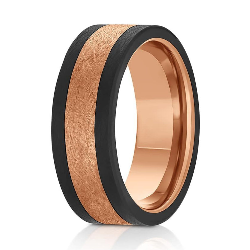 The Tortuga, a black and rose gold tungsten carbide ring that features a wire brushed finish and black edges.