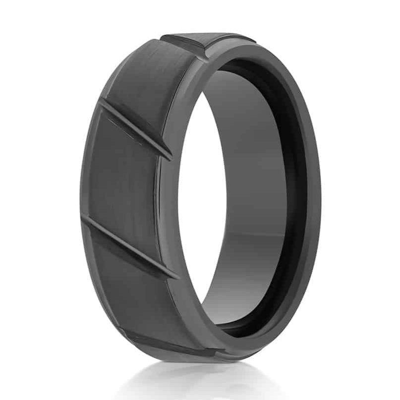 The True, a black tungsten carbide ring that features diagonal grooves and a brushed center with sleek, polished edges.
